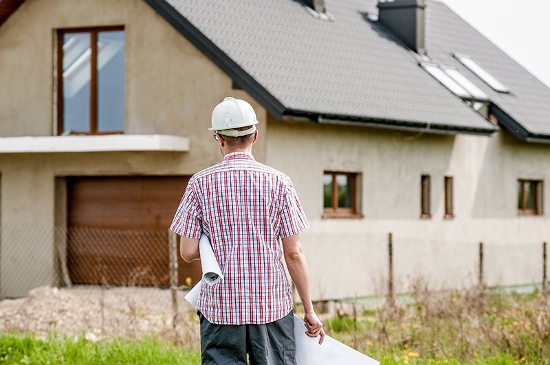 student looking at a house