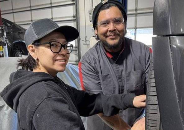 students working in an auto shop