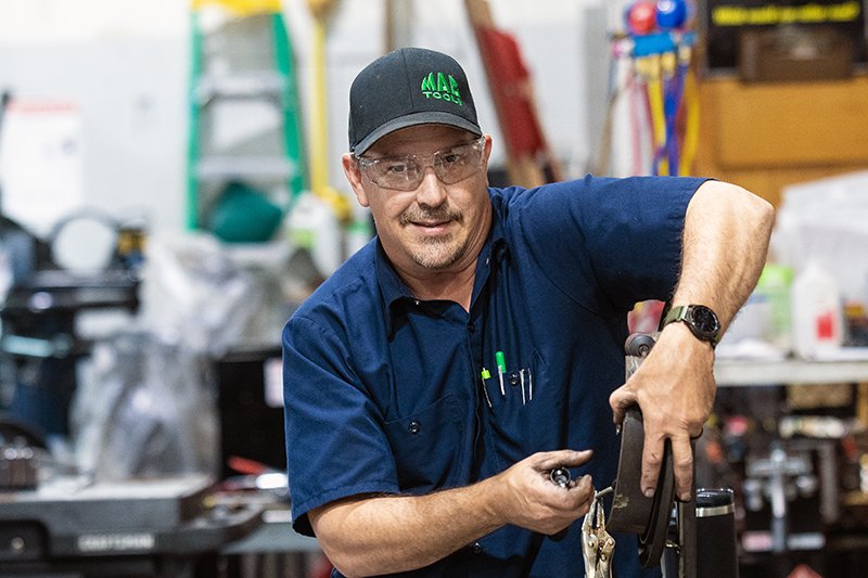 student working in an auto shop