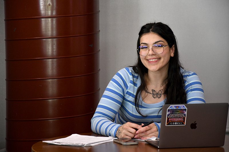 Female student smiling at camera