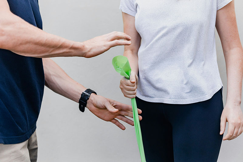 physical therapist working with a patient